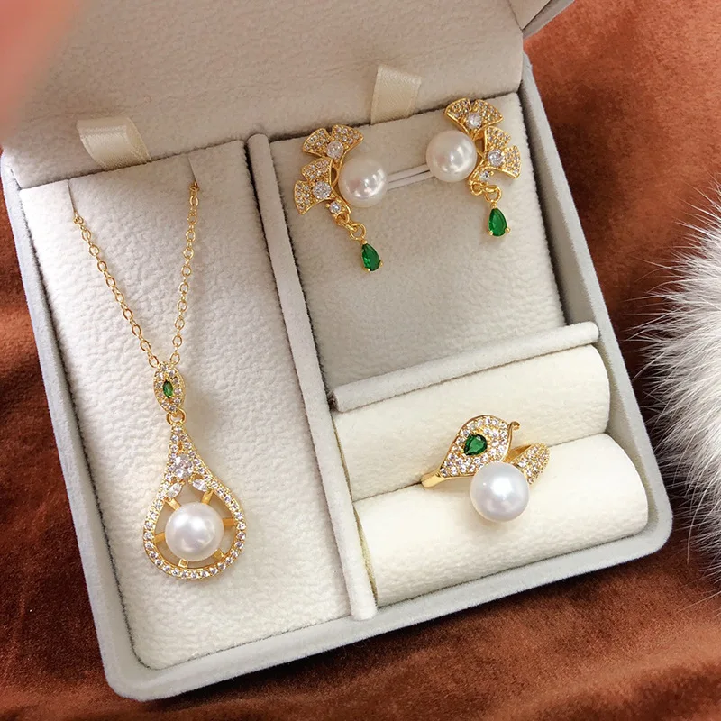 

2024New Freshwater Pearl Necklace, Earrings, and Ring Three-Piece Set for Women, Elegant and Fashionable Gift for Girlfriend or