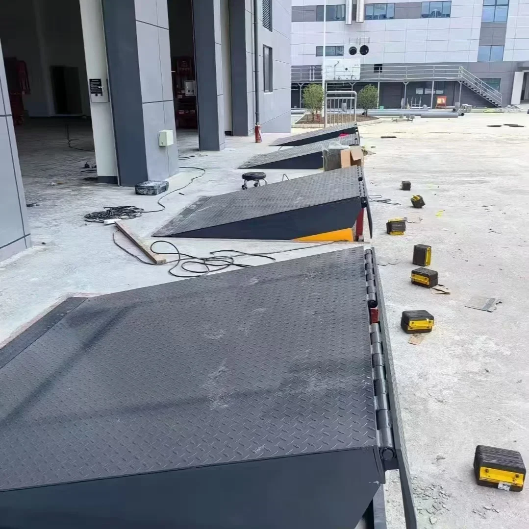 DCQG-6/8/10/12 TON Material manejo elevación tirando posicionamiento mesas elevadoras gran oferta puente de embarque fijo a buen precio