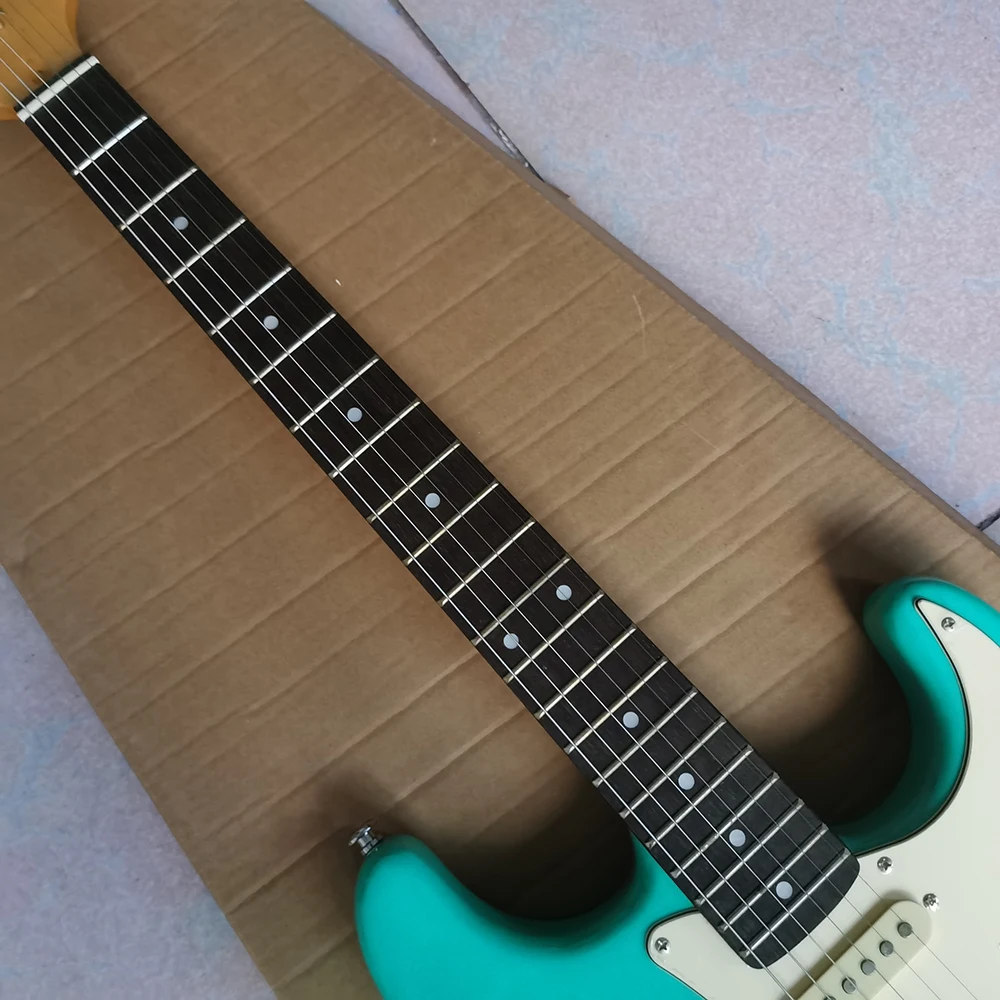 

In stock surf green guitar, retro pickup guard board, select the fastest shipping method according to the buyer's address