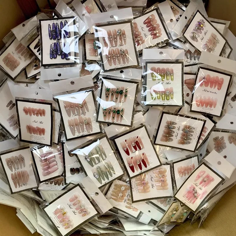 

Boutique new style random size hand-worn nail high-end cat eye orphan blind box nail patch long style