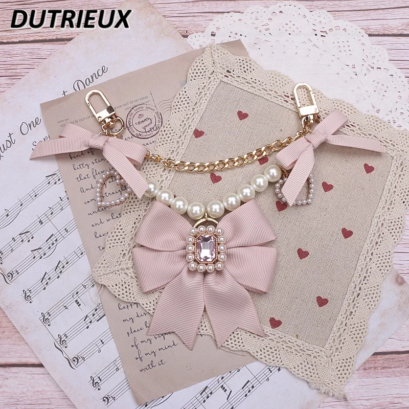 

Fashion Sweet Cute Stringed Pearls Bow Fashion Rhinestone Chain Bag Package Pendant Accessories for Women 2024 New Key Chains