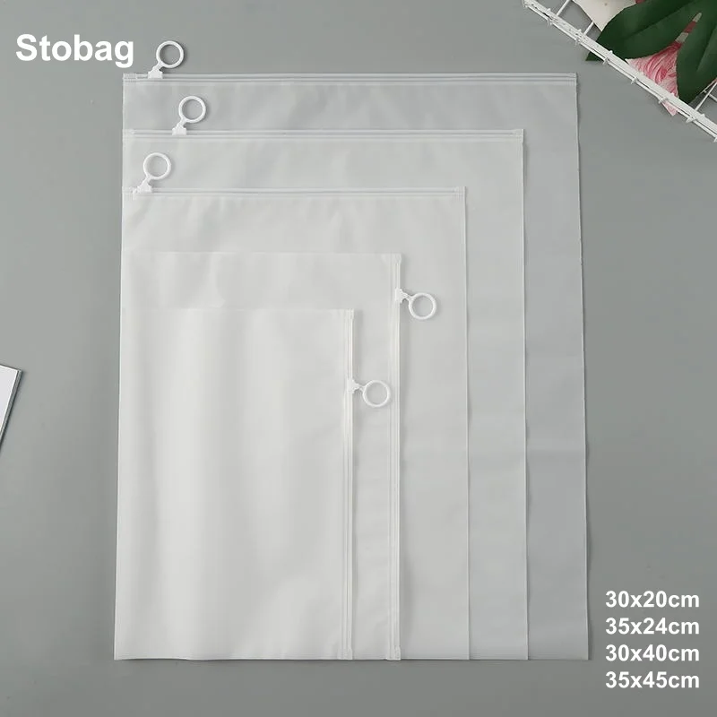 

StoBag 50pcs Wholesale Frosted Matte Zipper Bags EVA Plastic Pull Loop Packaging Pouch Sealed T-shirts Clothes Storage Pocket