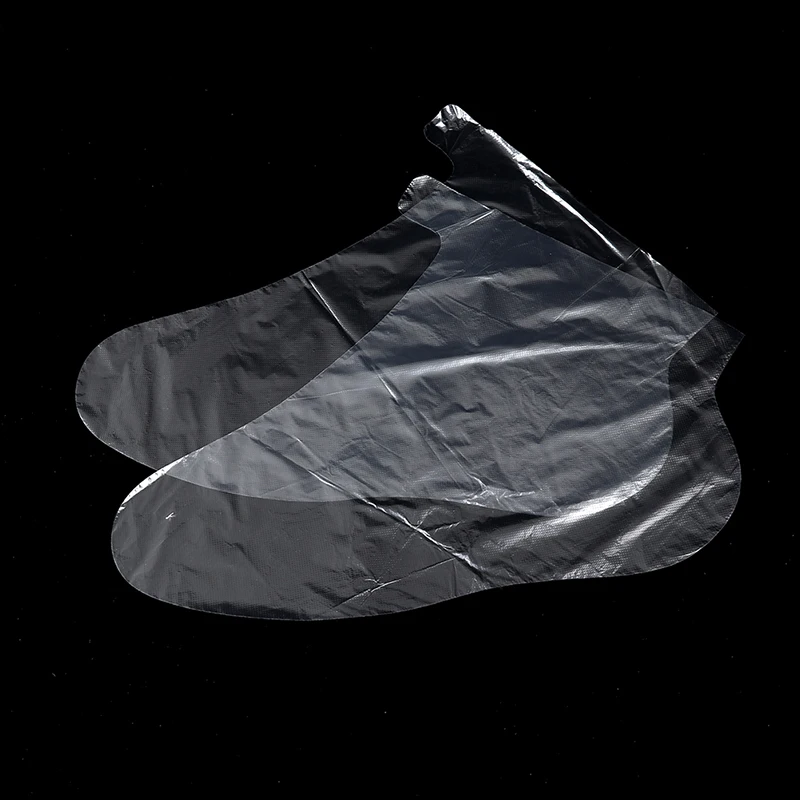 100 Uds. Mascarilla de plástico exfoliante desechable transparente para pies, revestimiento para baño, pedicura, Spa, bolsa de cubierta de cera, calcetín