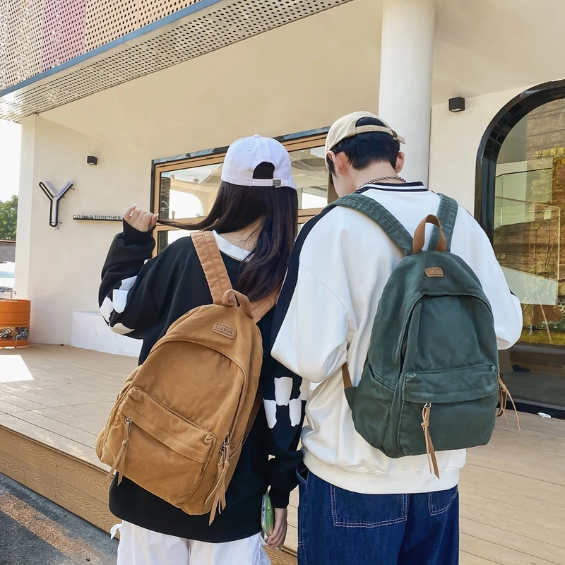 Nova moda feminina lona dos homens de alta capacidade faculdade mochila na moda feminina portátil sacos escolares bonito menina viagem saco livro legal