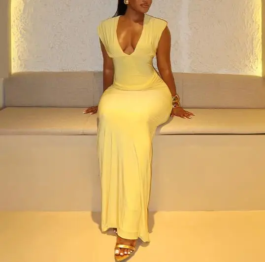 

2026 Fall New Women's Fashion Yellow Deep V-Neck Pleated Sleeveless Sexy Hip Wrap Dress Female Slimming Sexy Elegant Dresses