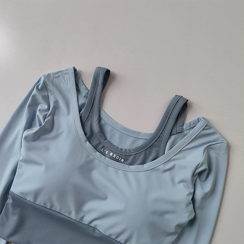 Zweiteiliger Yoga-Anzug mit Brustpolster, langen Ärmeln und kurzem, schlankmachendem, schnelltrocknendem Fitness-Oberteil für Damen. – Detail 9