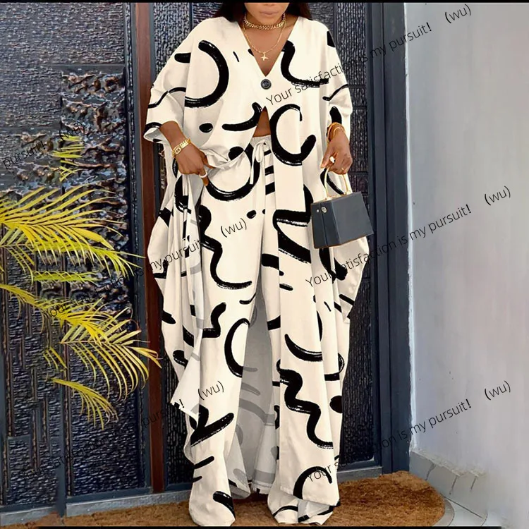 

Комплект женской юбки с принтом, модный V-образный вырез, свободная длинная рубашка с рукавами семь четвертей, брюки на шнурке.