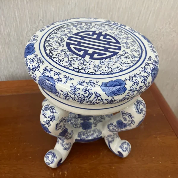 Blue and white porcelain, a classical-style four-legged stool, a floor-standing decorative piece for the living room,