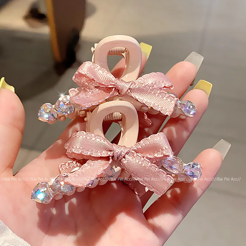 

Корейский женский зажим с розовым бантом, супер сверкающие стразы, заколки для волос в виде краба для девочек, аксессуары для волос, новинка 2025, когти для волос для женщин
