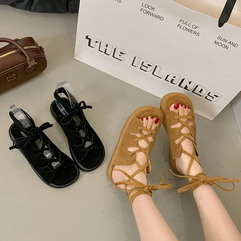 

Женские сандалии, новинка лета 2024, модная женская обувь на плоской подошве с открытым носком и завязками, повседневные элегантные пляжные сандалии-гладиаторы на шнуровке