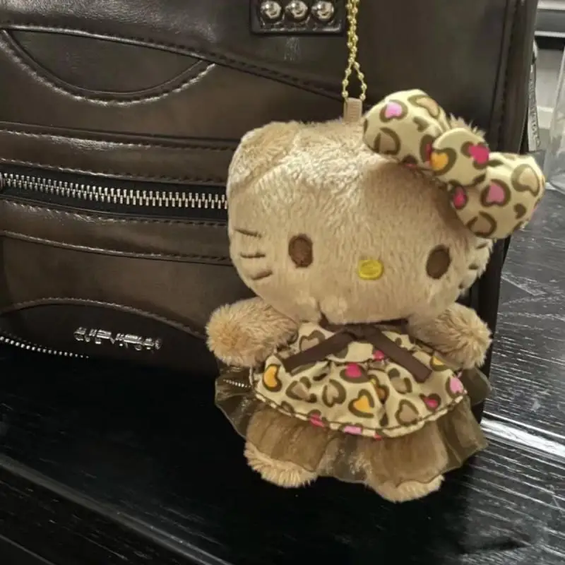 Sanrio hitam kulit Hello Kitty Leopard cetak gantungan kunci kartun mewah mainan Kawaii ransel liontin lucu boneka hadiah Halloween