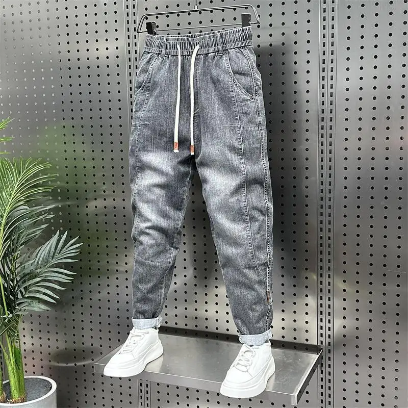 Moda di lusso ampia vita elastica denim harem jeans abbigliamento da uomo designer baggy jogger blu pantaloni casual per uomo