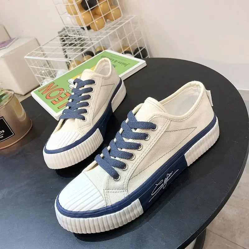 Vendita calda coppia tela piatta da uomo vulcanizzata primavera estate moda Unisex scarpe Casual Sneakers