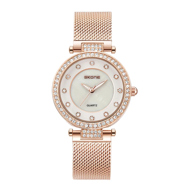 SKONE Diamond light lujo moda simple reloj de mujer correa de malla versión coreana casual temperamento reloj de cuarzo