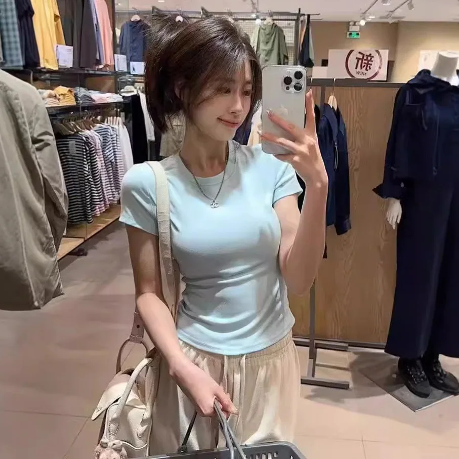 Ronde hals en korte mouwen Tees T-shirt Dames Lente Herfst Nieuwe onregelmatige zoom Slanke casual top Effen onderkant shirts Nieuw Koreaans