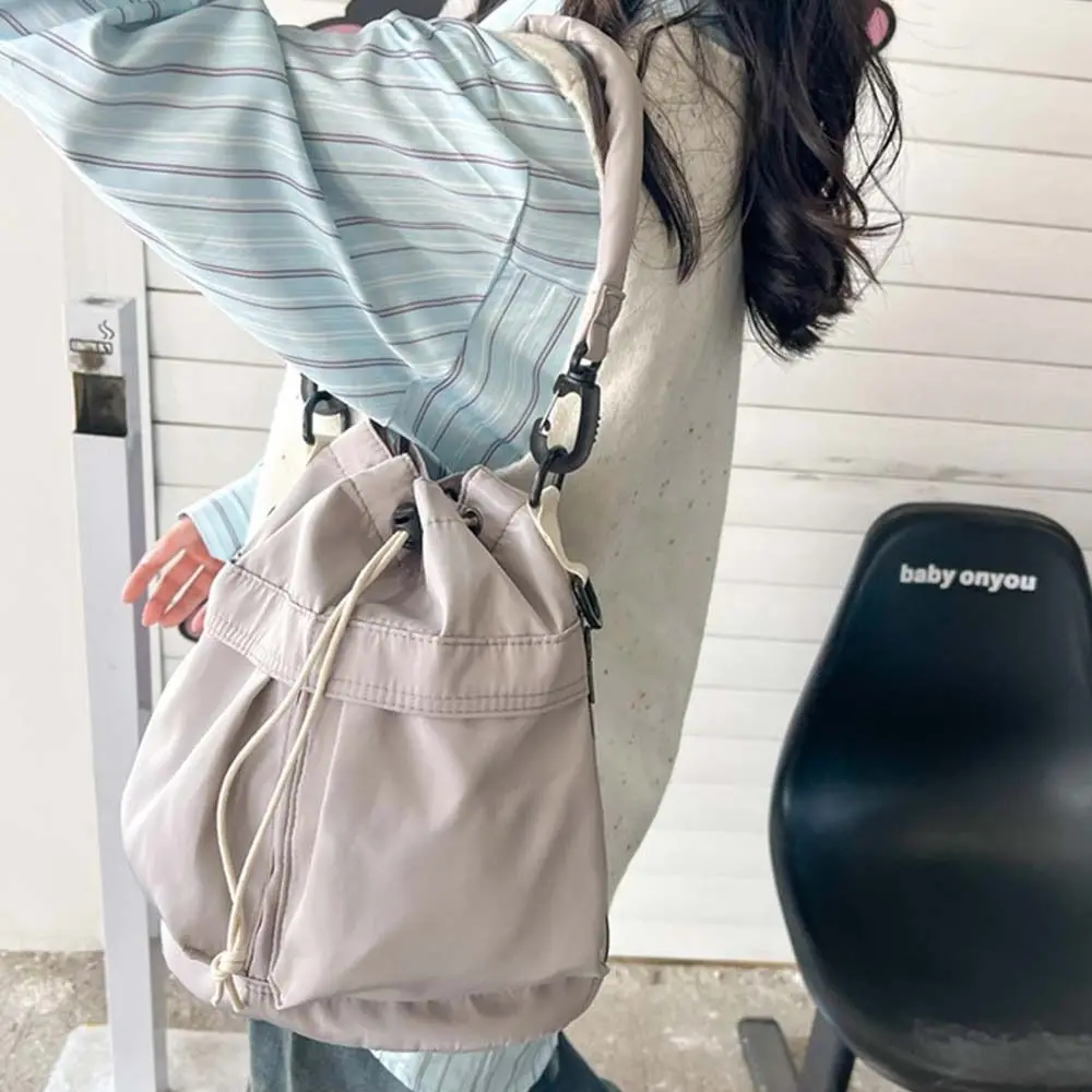 Koreaanse stijl zwemmen nylon crossbody tas grote capaciteit nylon trekkoord fitnesstas effen kleur niche ontwerp emmer tas reizen