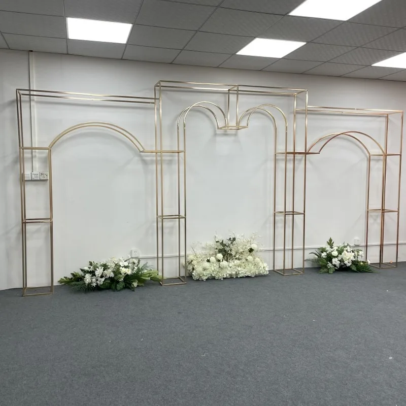 

Wrought iron screen wedding stage arrangement, golden heart-shaped arches, background frame