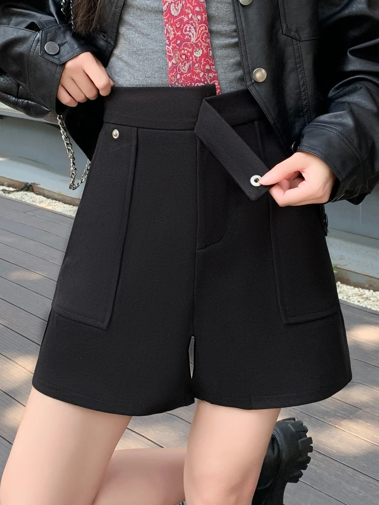 Shorts de perna larga de lã irregular para mulheres no outono e inverno 2025 novo bolso de cintura alta emagrecimento calças curtas linha A