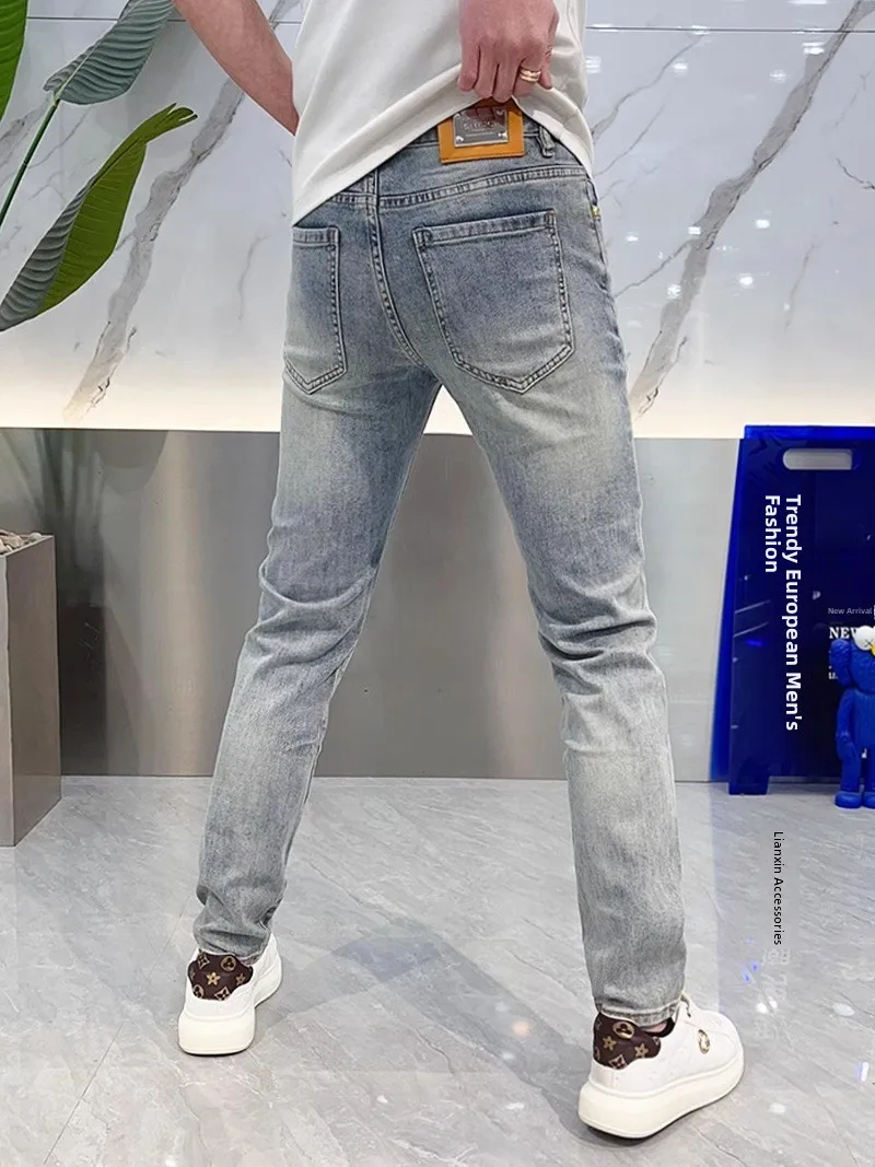 

Spring 2025 Men's Slim Fit Jeans Smooth Denim Versatile ular mid Waist Trendy Small Foot Pants Long Trousers Breathable