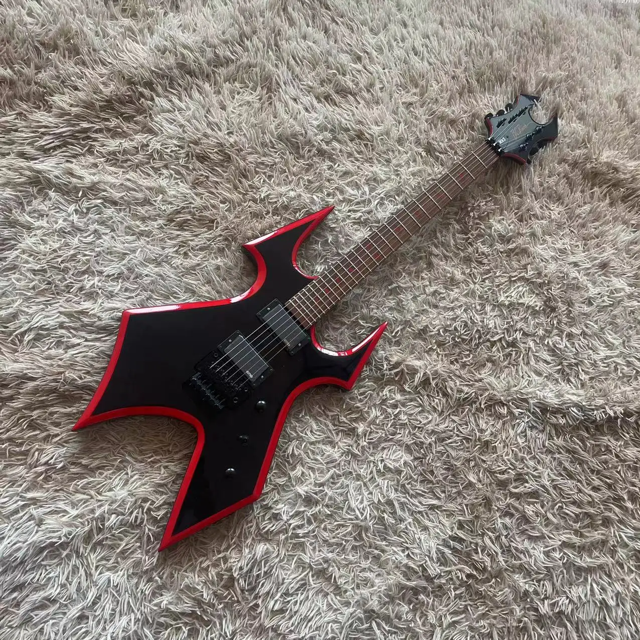 B. C. Rich special-shaped all-in-one Electric guitar, black body, red rim, high gloss, black accessories, LP string bridge, EMG