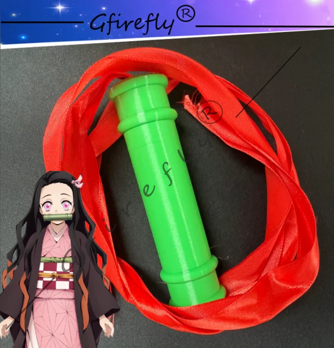 

Anime Character Kamado Nezuko Dressed Up As The Same Bamboo Tube Prop Cosplay Accessory for Halloween At The Comic Convention