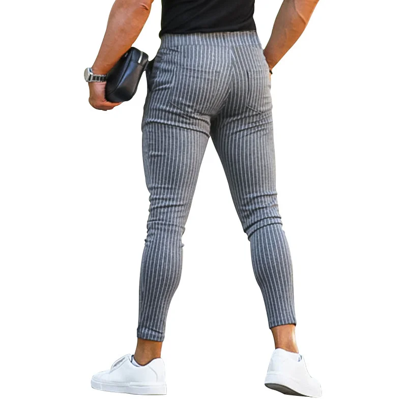 Pantalones pitillo ajustados de cintura alta para hombre, pantalones a rayas informales, ropa de calle de moda, nueva tendencia, cuatro estaciones