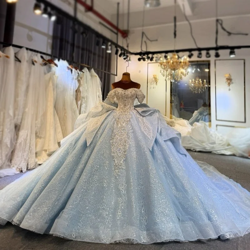 

Блестящие синие платья для квинсеаньеры с открытыми плечами, украшенные блестками и кристаллами, с длинным шлейфом и бантом, Vestido De 15 Quinceanera, на заказ