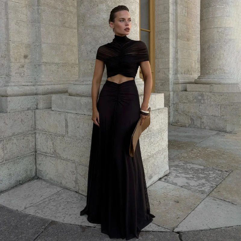 Europeo americano sexy moda estiva vita alta tinta unita maglia borsa pieghettata glutei ombelico esposto abito lungo abbigliamento da donna