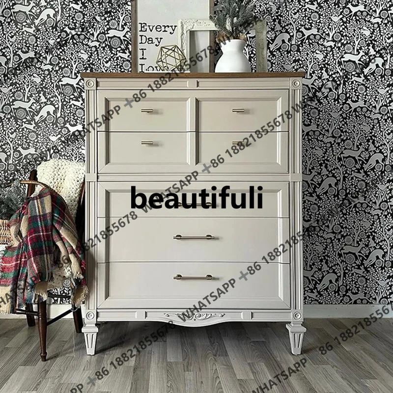 French contrast carved small apartment home living room TV next to high chest of drawers American retro