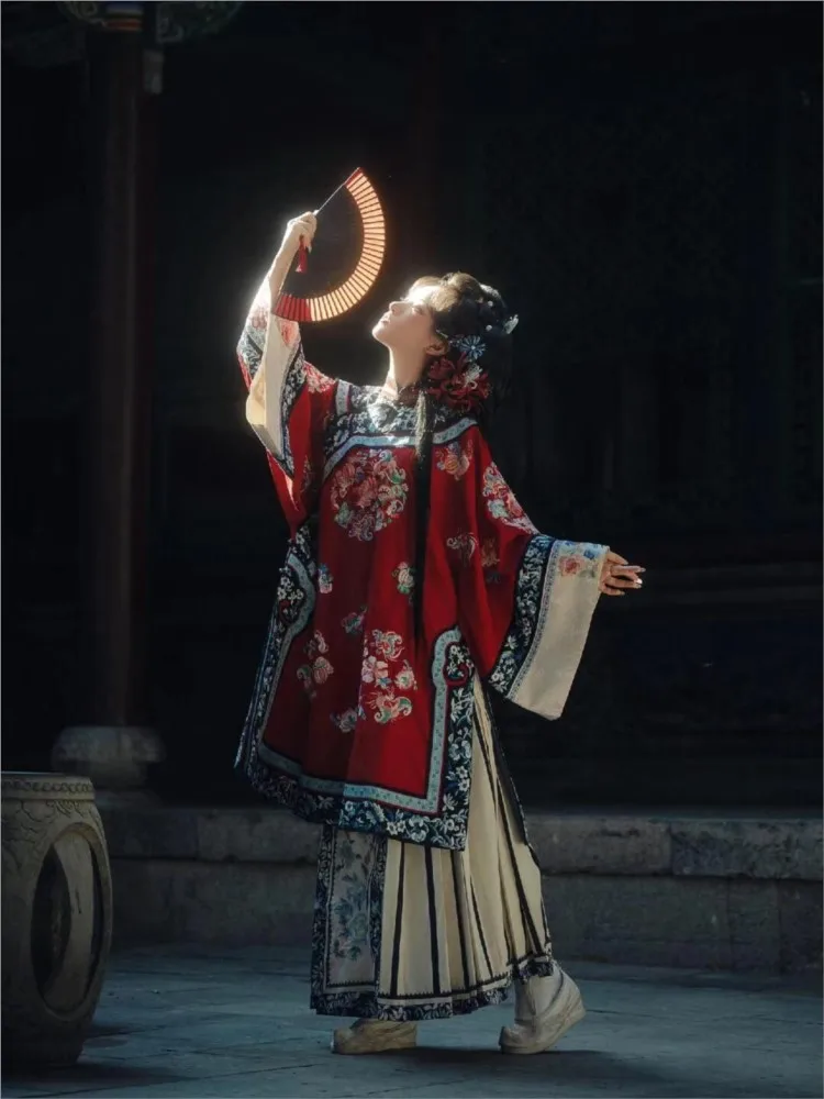 

A female Hanfu with red cape and slanted front