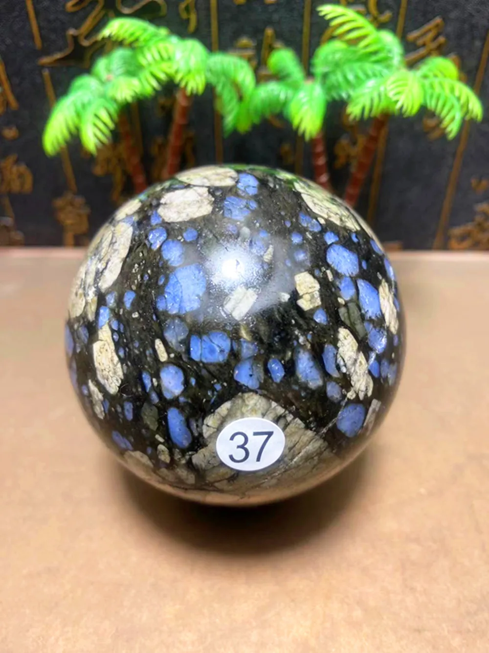 Natural blue sparkly crystal ball, for divination magic and meditation, as a home decoration item