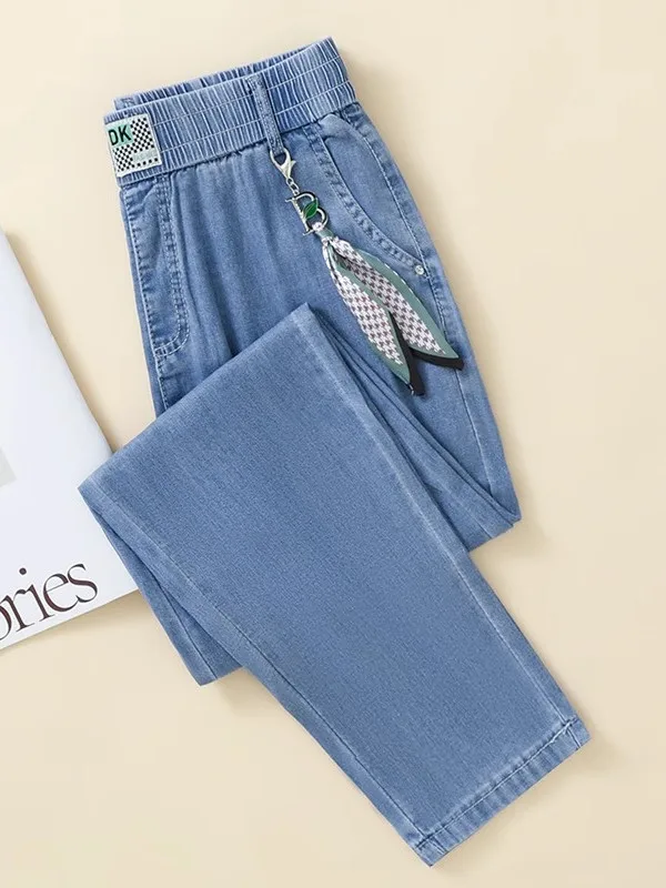 กางเกงยีนส์เอวบางยืดหยุ่นสำหรับฤดูร้อน รุ่นปี 2025 ทรงฮาร์แลน ความยาวเก้าส่วน สไตล์ลำลอง ไซส์ใหญ่ ทรงหลวม ผ้าไหมน้ำแข็ง ทรงกางเกงกะหล่ำปลี