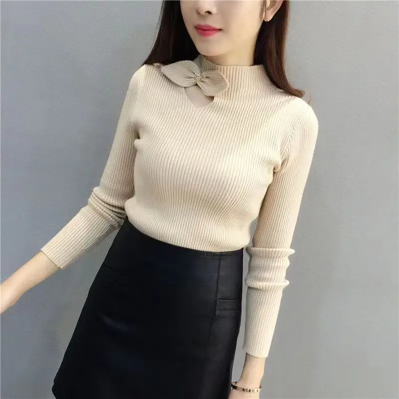 Koreańska moda Jesień Zima Swetry Kobiety Mock Neck Bow Hollow Out Gruby biurowy damski długi rękaw Luźne pulowery Dzianinowy top