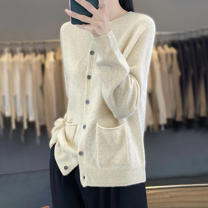 100% pure wool 2024 new model.. Women's knitted wool sweater with loose round neck pocket