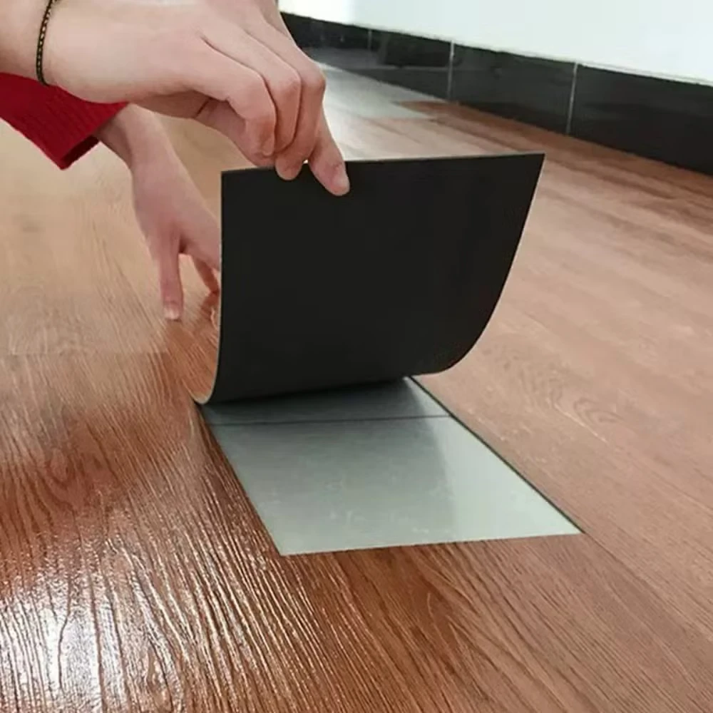 Adesivo per pavimenti in vinile laminato con clic autoadesivo Piastrella in pietra per piano in vinile Spc Pavimenti ibridi Guangdong