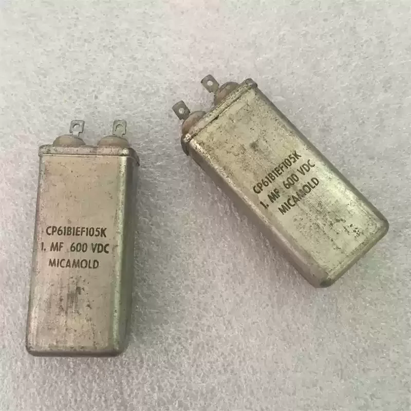 

Антикварный американский MICAMOLD 600 В 1 мкФ CP61B1EF105K, машина для желчного пузыря, соединенный масляный конденсатор