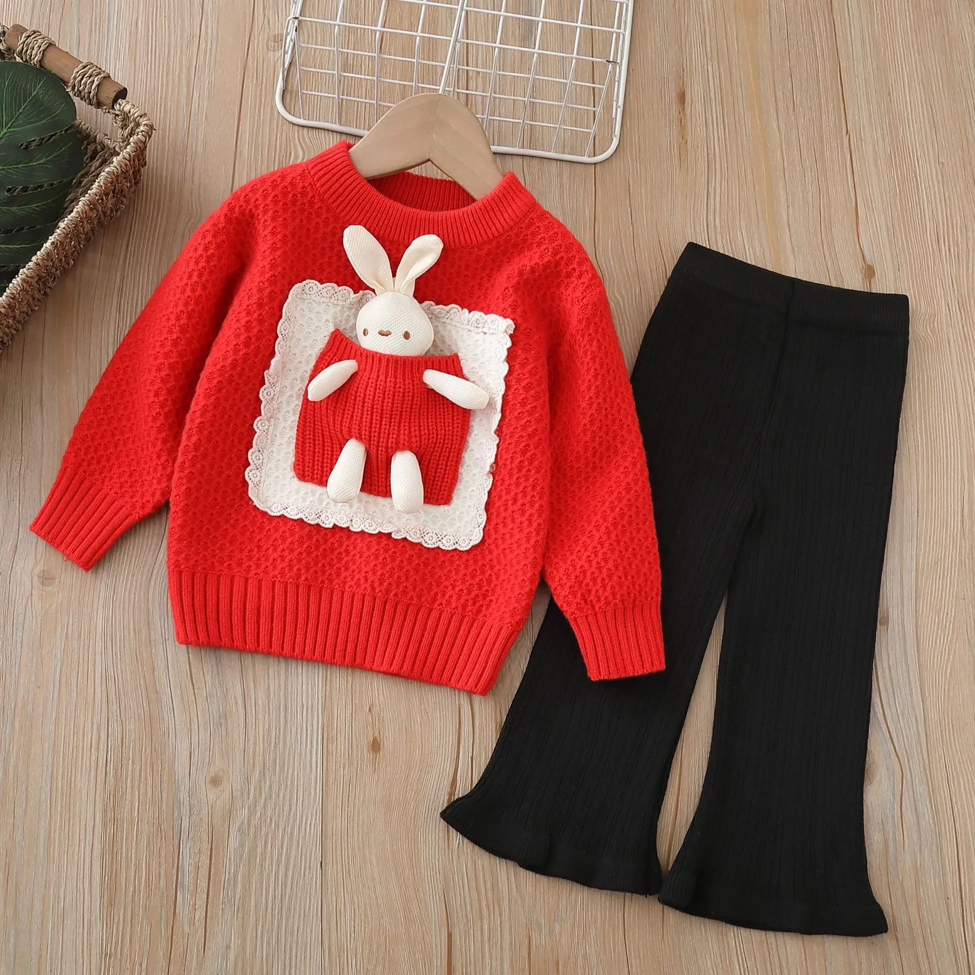 

A two-piece knitted sweater set for girls in winter, a cute cartoon rabbit round-neck pullover with a cute top and pants