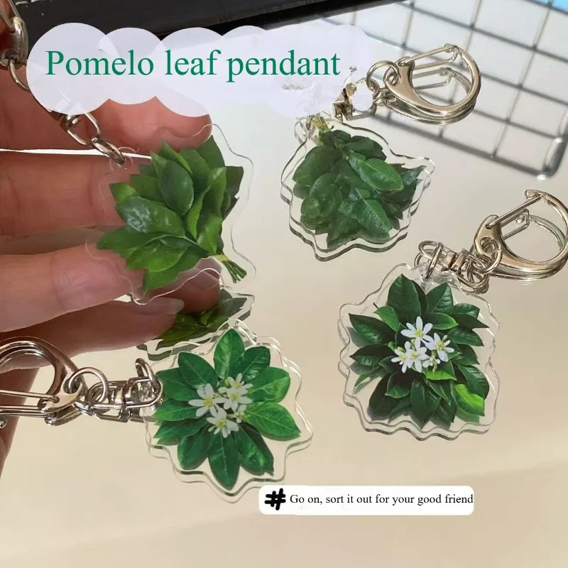 Costumbres tradicionales populares, llaveros con hojas de pomelo, amuletos de buena suerte, pequeños colgantes