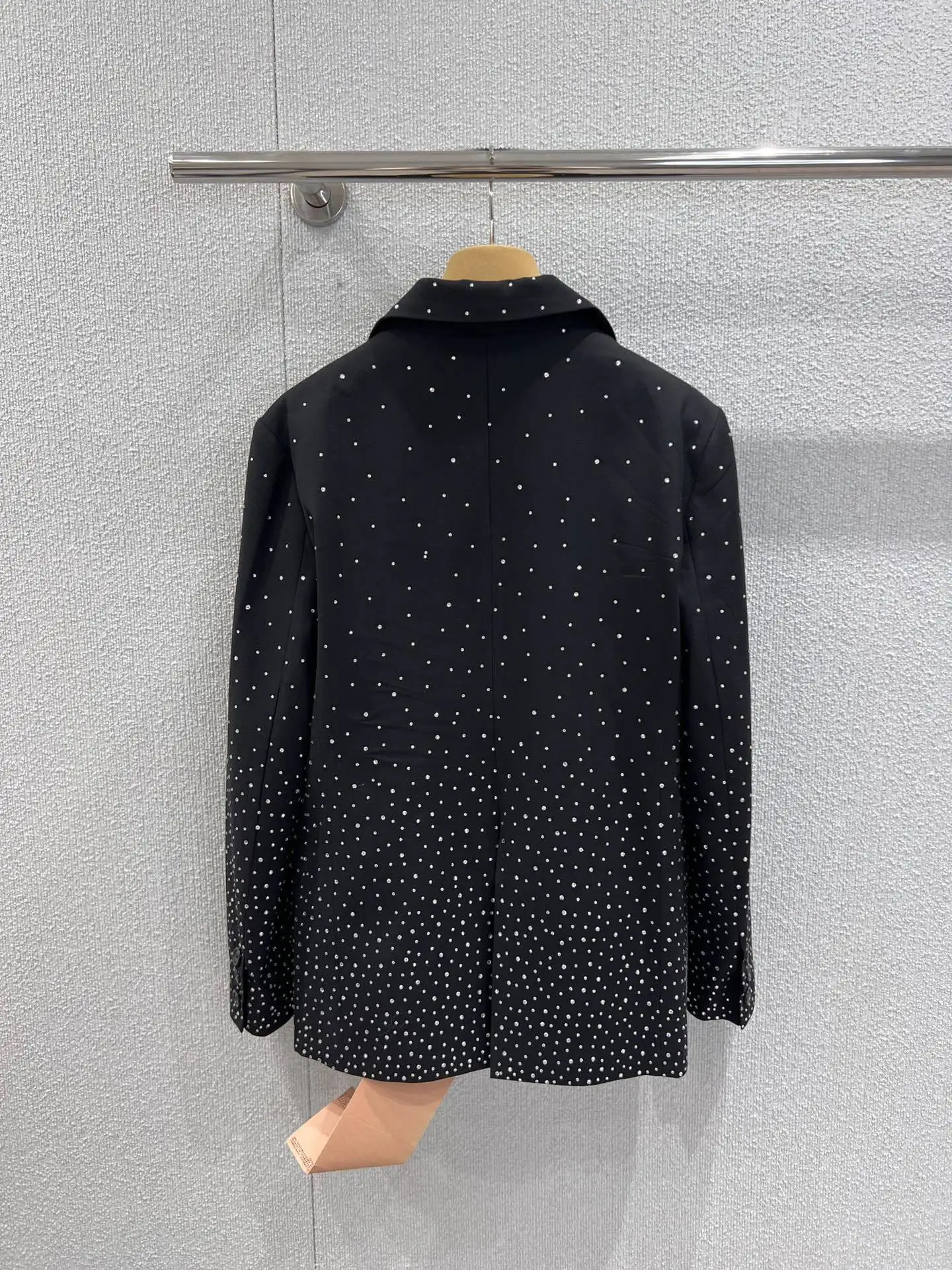 

Black starry sky handcrafted rhinestone blazer with one-shoulder silhouette, luxurious and elegant top with a refined style