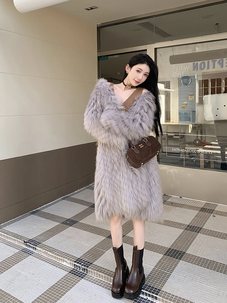 패션 디자인을 갖춘 새로운 세련되고 넉넉한 긴 너구리 개 모피 여성 모피 겉옷