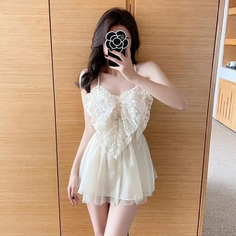 Traje de baño de una pieza con falda de playa delgada conservadora sin espalda sexy con agradable arco y tirantes de color sólido