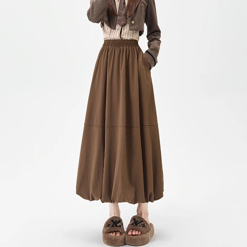 

Корейская версия Юбка трапециевидной формы с высокой талией Женская юбка-фонарь средней длины Дизайнерская полуюбка с цветочным бутоном на осень