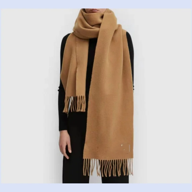 

Nordic niche women's Korean version versatile solid color warm and thick extra long wool tassel shawl scarf