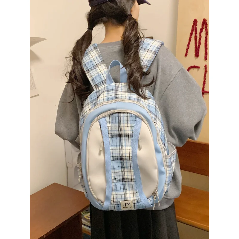 

Korean StyleinsPlaid school backpack for junior high school girls, high aesthetic appeal, niche design, large capacity, lightwei