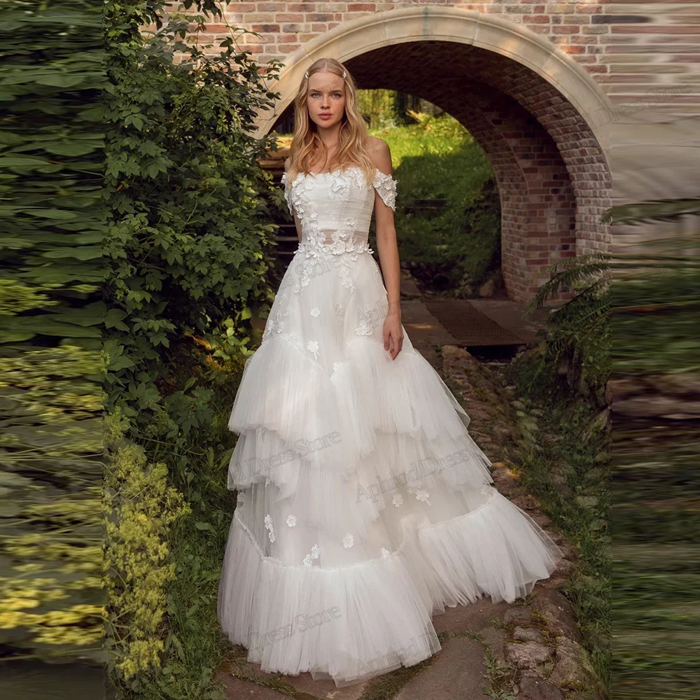 فساتين زفاف رائعة على شكل حرف A زي العرائس تول طبقات رداء دانتيل زينة قبالة الكتف Vestidos De Novia مخصصة 2026 #1