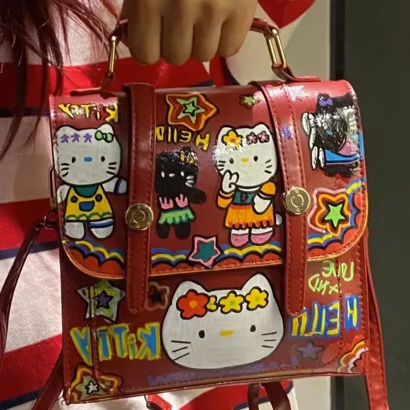 

Новый рюкзак Sanrio с мультипликационным рисунком Hello Kitty, милый рюкзак с граффити, школьный рюкзак для учеников младшей и старшей школы