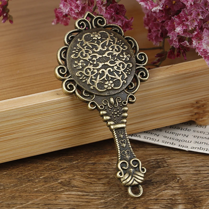 Espejo antiguo en miniatura para casa de muñecas, marco de Metal Vintage de bronce antiguo, muebles de baño, accesorios para casa de muñecas, 1 ud.