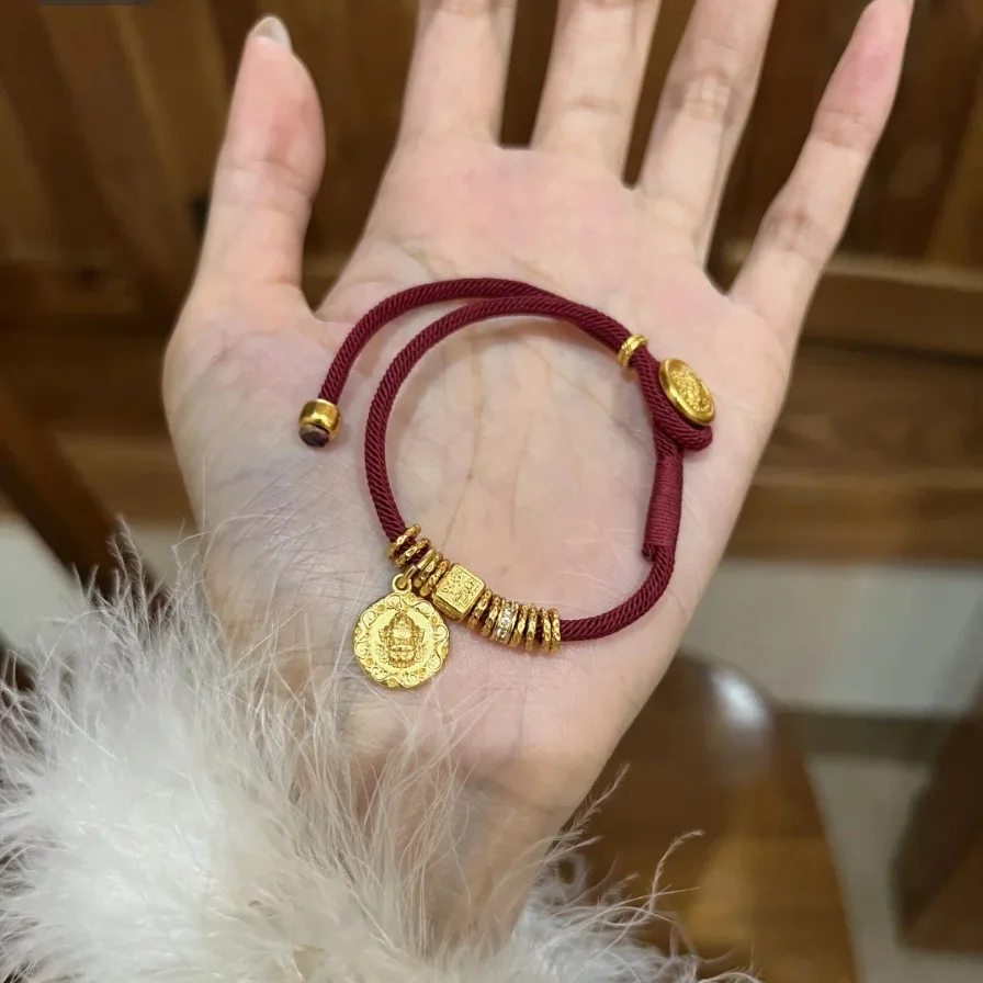

Plated Real Gold Strong Preservation Chinese Ancient Method Point Diamond Yellow God Of Wealth Coiled With Red Rope Girls Gift