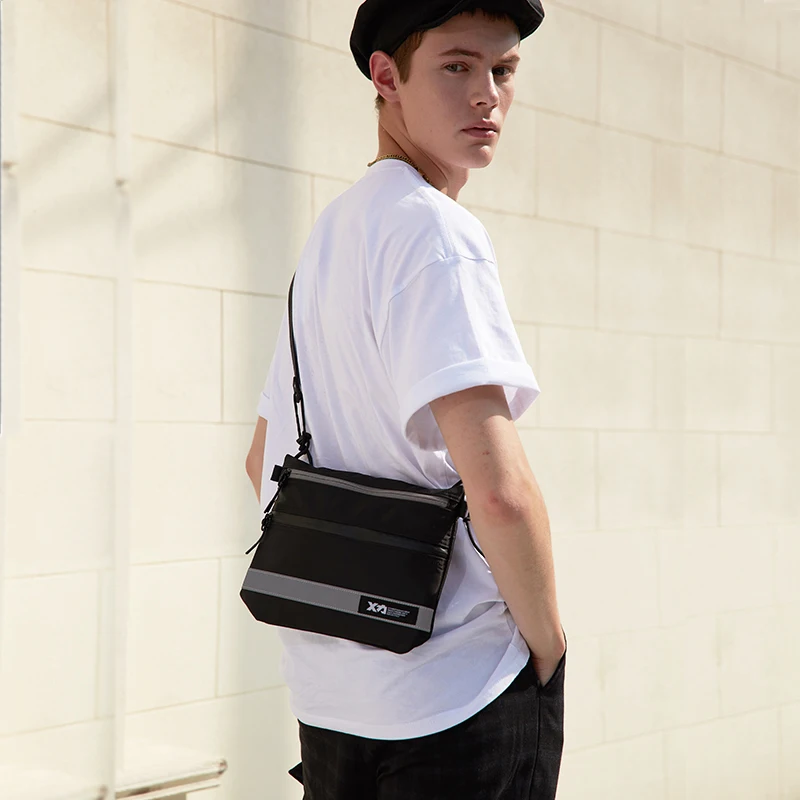 軽量クロスボディバッグ-ユニセックス-ストリートスタイル-ポリエステル素材-ジッパー開閉-反射ストリップ-内部構造-折りたたみ可能