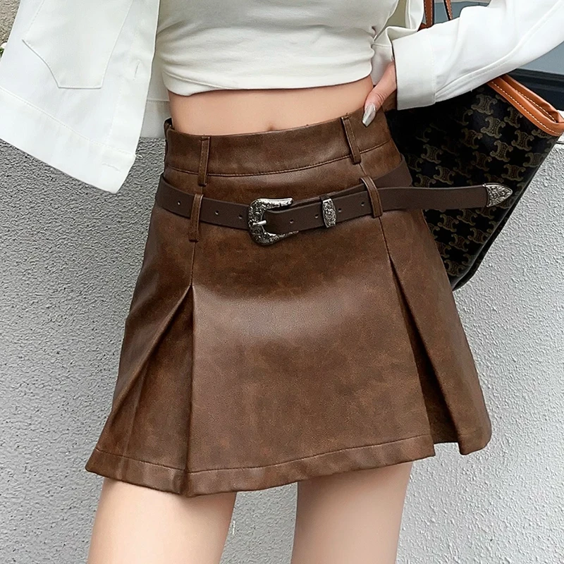 

QOERLIN Vintage Belt Mini Skirts Sexy Short PU Faux Leather Skirts Korean Fashion Loose Casual Skirt for Teen Girls Zipper Skirt